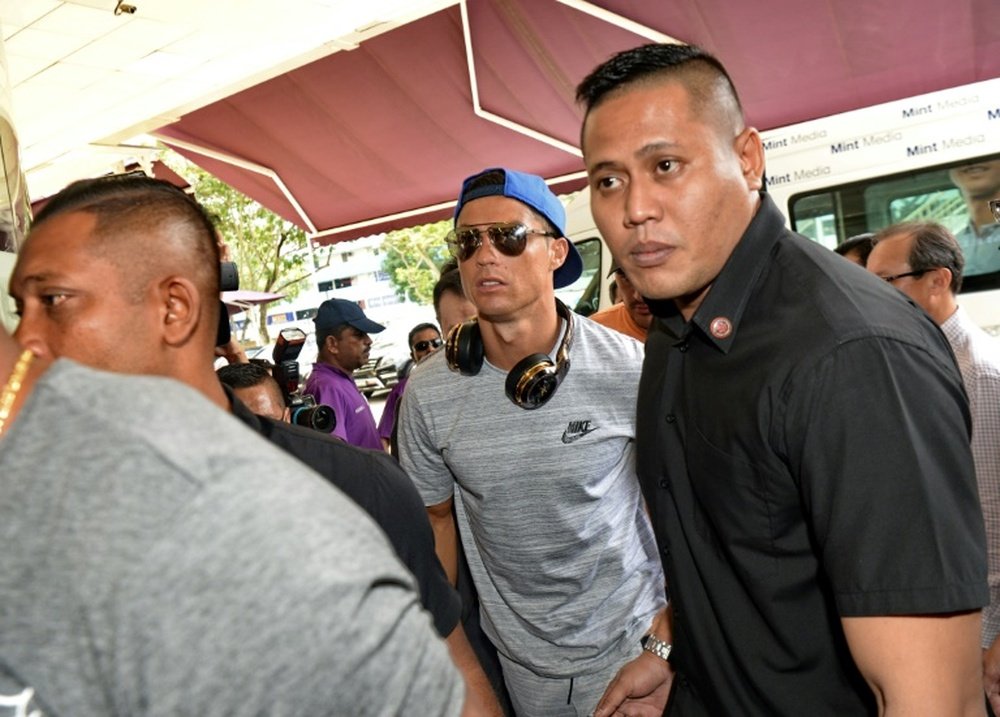 Ronaldo jetted into Singapore for a flying visit to Valencia owner Peter Lim. AFP