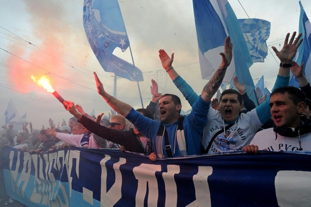 FC Zenit St.Petersburg fans celebrate prior to the football match between FC Zenit and FC Ufa in St.Petersburg on May 17, 2015