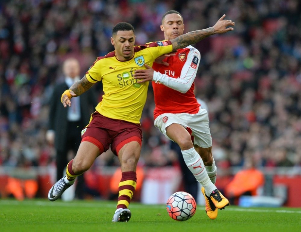 Burnleys English striker Andre Gray (L) vies with Arsenals English defender Kieran Gibbs during the English FA Cup fourth round football match between Arsenal and Burnley at the Emirates stadium in London, on January 30, 2016