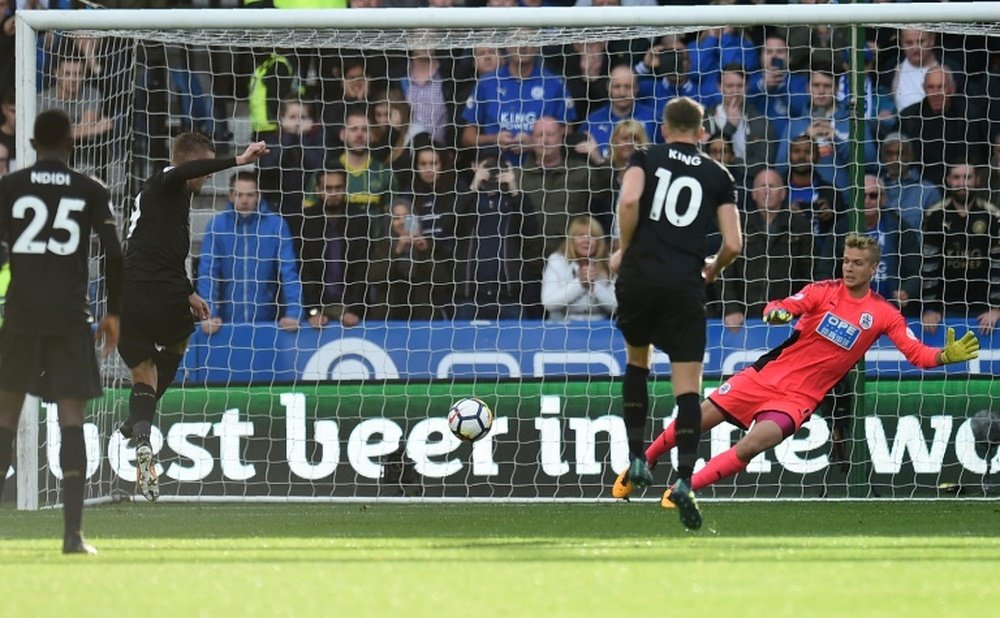 Vardy scores from the spot. AFP