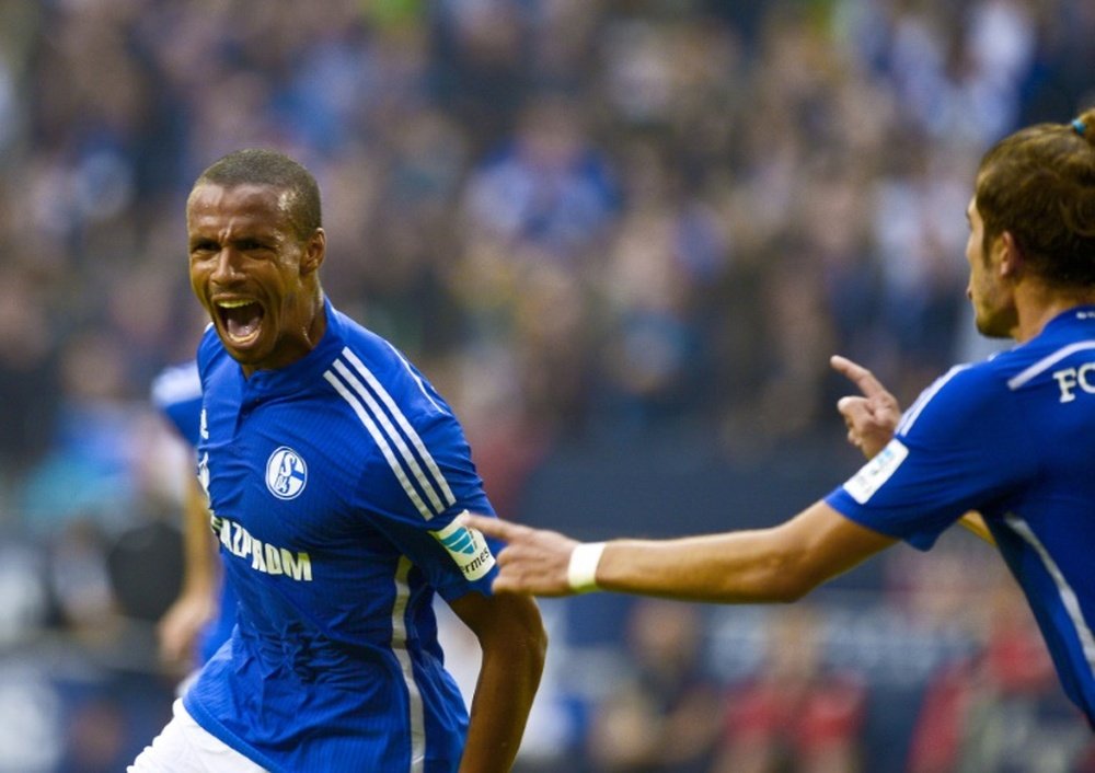 Schalkes defender Joel Matip celebrates after scoring during a German first division Bundesliga football match against Mainz, in Gelsenkirchen, on September 13, 2015