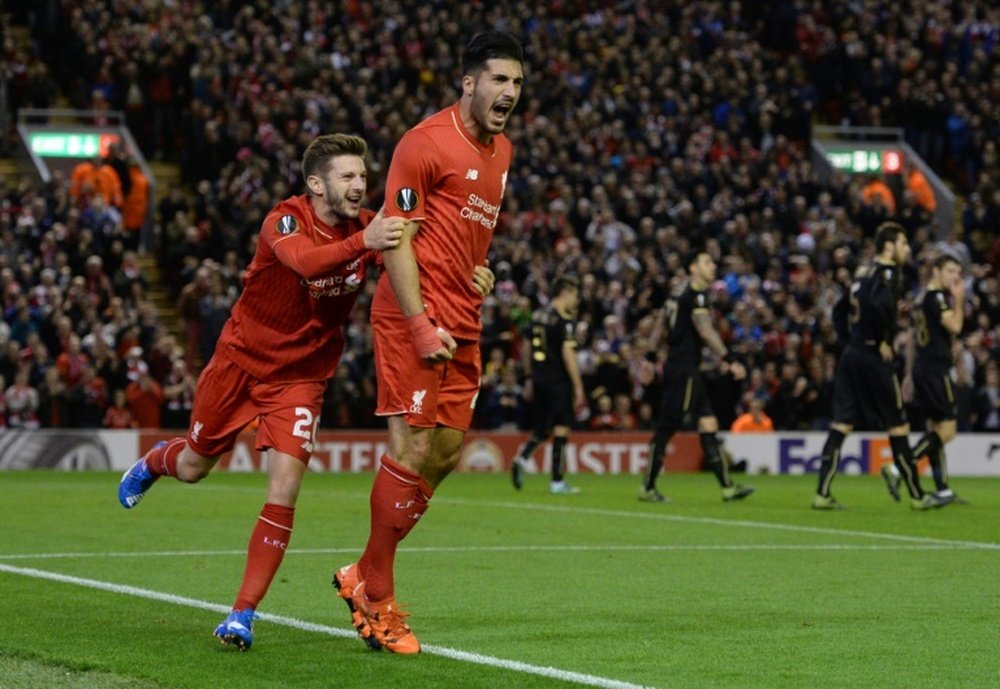 Liverpools German midfielder Emre Can (C) celebrates after scoring his teams first goal during a UEFA Europa League group B football match between Liverpool FC and FC Rubin Kazan at Anfield in Liverpool, north west England, on October 22, 2015