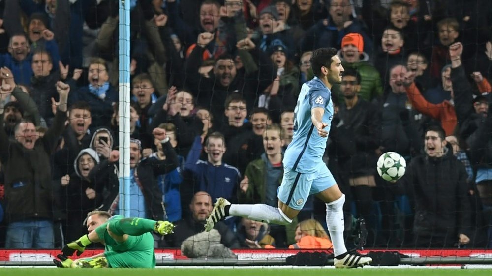 Manchester Citys Ilkay Gundogan celebrates scoring his teams third goal during their UEFA Champions League Group C match against Barcelona, at the Etihad Stadium in Manchester, on November 1, 2016