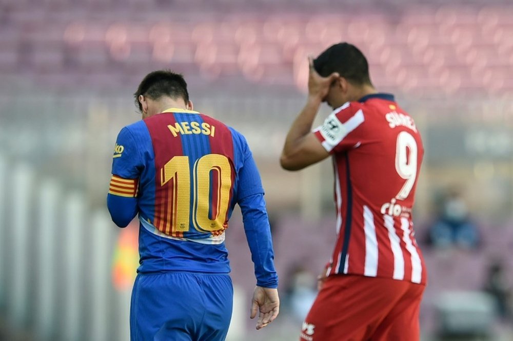 Suárez actuó de intermediario entre Messi y el Atlético para intentar su fichaje. AFP
