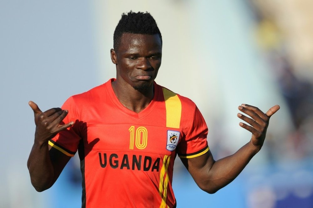 Uganda's Luwagga Kizito celebrates after scoring a goal during their CAF qualifyer. AFP