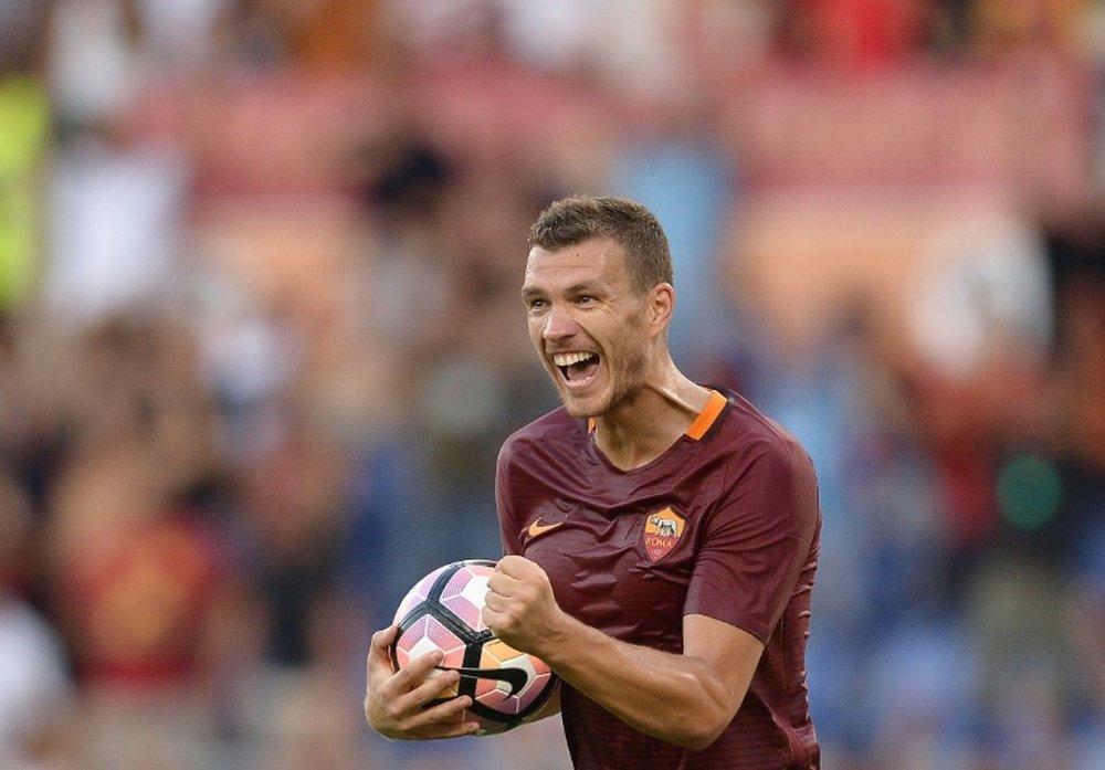Roma's forward Edin Dzeko celebrates. AFP