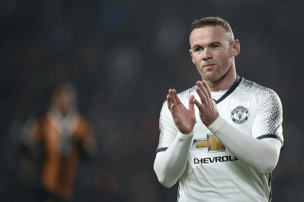Manchester Uniteds striker Wayne Rooney claims he will stay at Manchester United. AFP