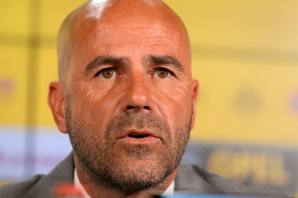 Dortmund coach Peter Bosz managed Amsterdam one season. AFP