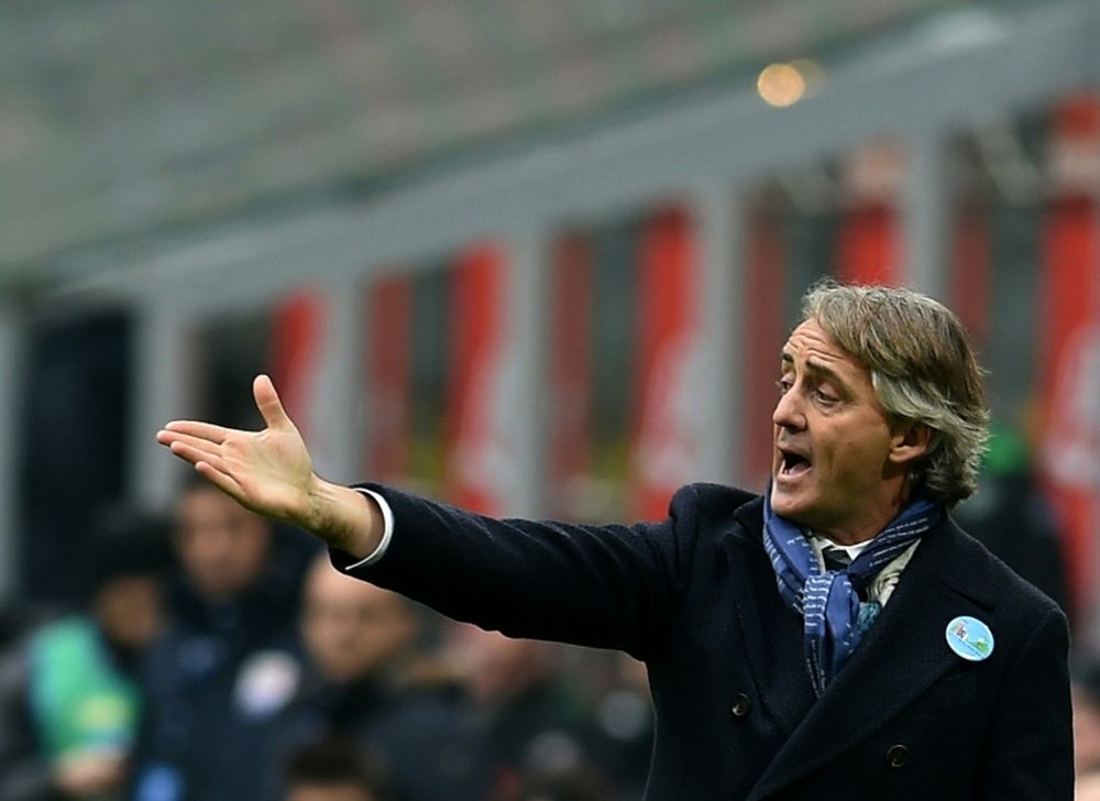 Mancini open to coaching Italy. AFP