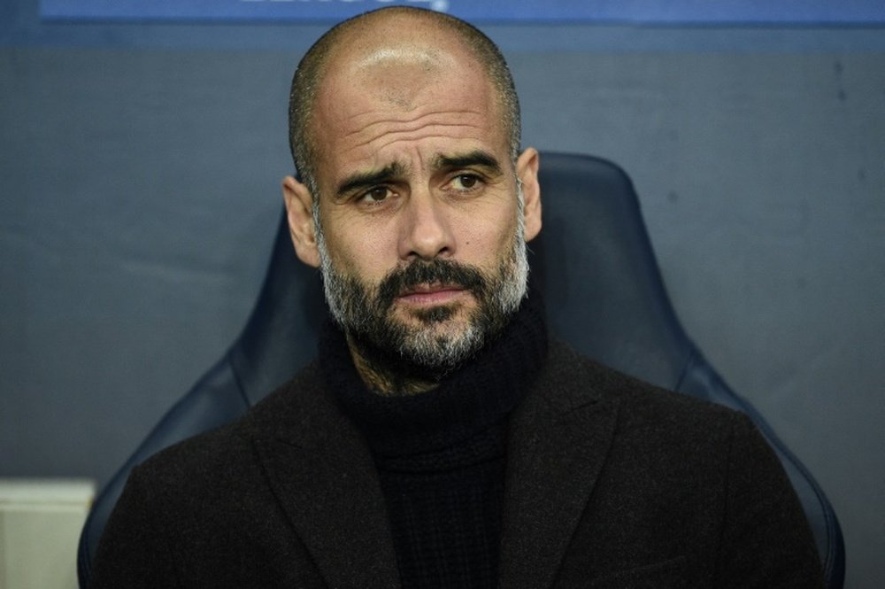 Manchester City's manager Pep Guardiola is thinking about his future. AFP