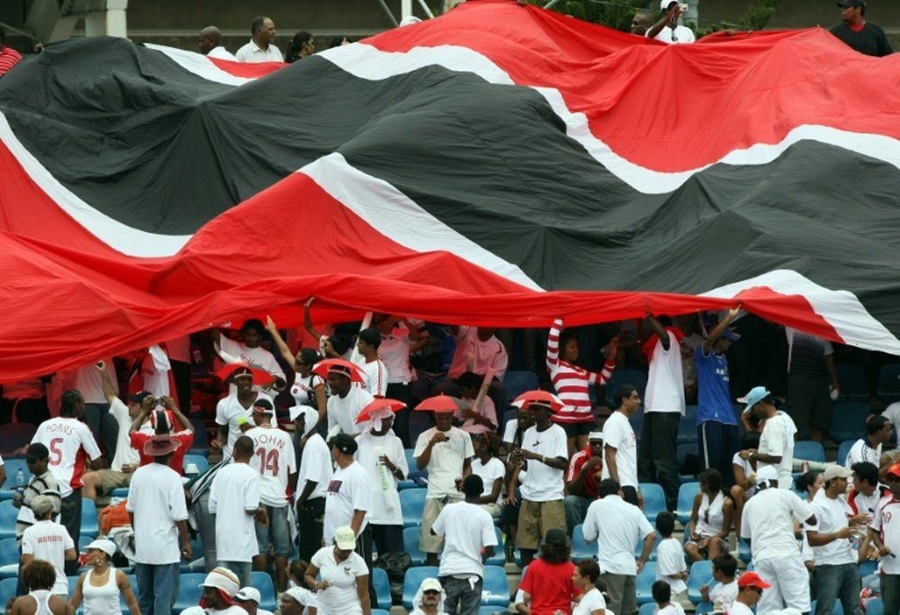 Trinidad insist US game on despite water-logged pitch. AFP