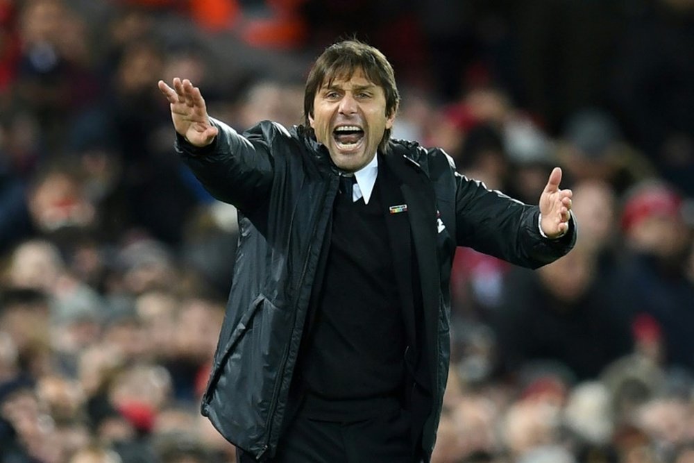 Conte has hailed his players' character ahead of their trip to Huddersfield. AFP