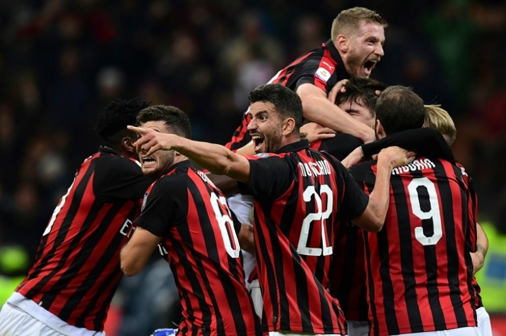 AC Milan snatched a last-gasp win at Udinese thanks to defender Alessio Romagnoli
