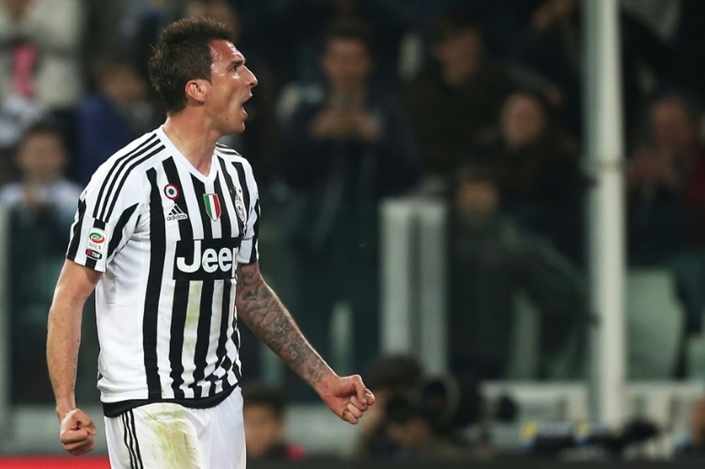 Juventus forward Mario Mandzukic from Croatia celebrates after scoring during the Italian Serie A football match against Empoli on April 2, 2016