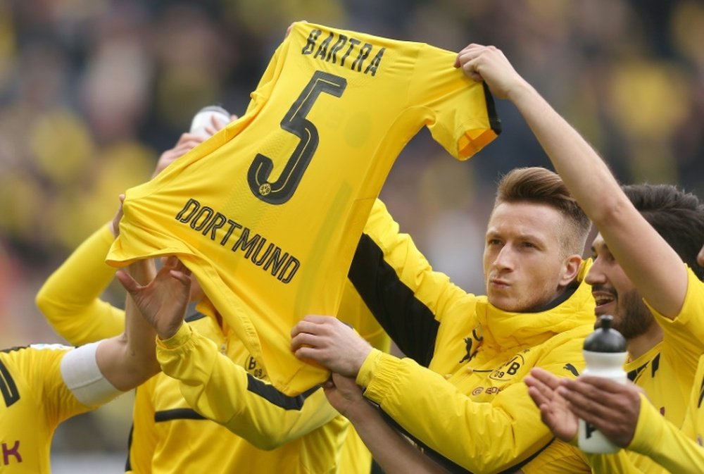 El último partido en Dortmund estuvo precedido por el terror de un atentado. AFP