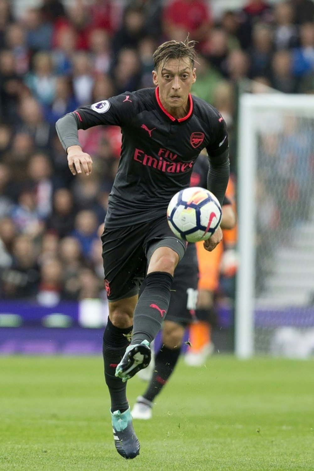 Ozil starred in Arsenal's 5-2 victory away at Everton. AFP