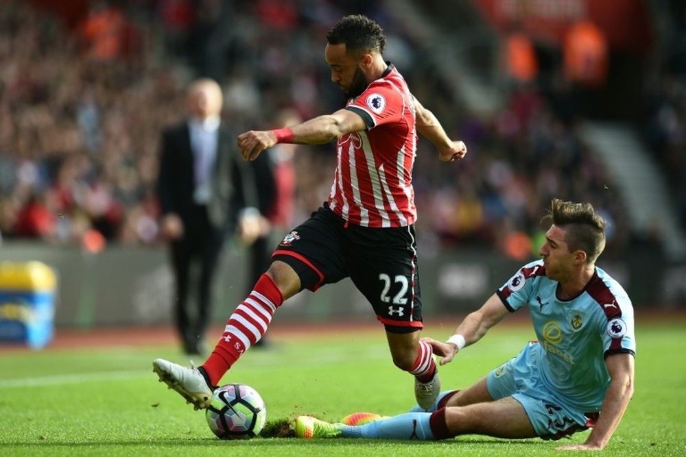 Hughes has called on Southampton fans to go easy on Redmond. AFP