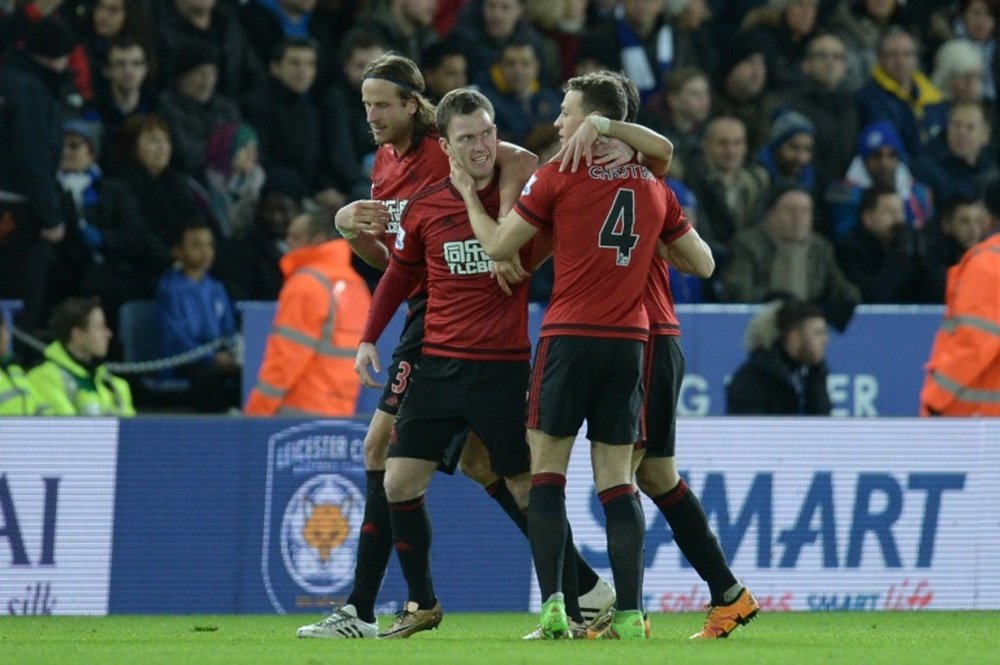 West Bromwich Albions midfielder Craig Gardner (2ndL) celebrates scoring their second goal against Leicester City at the King Power Stadium in Leicester, central England on March 1, 2016