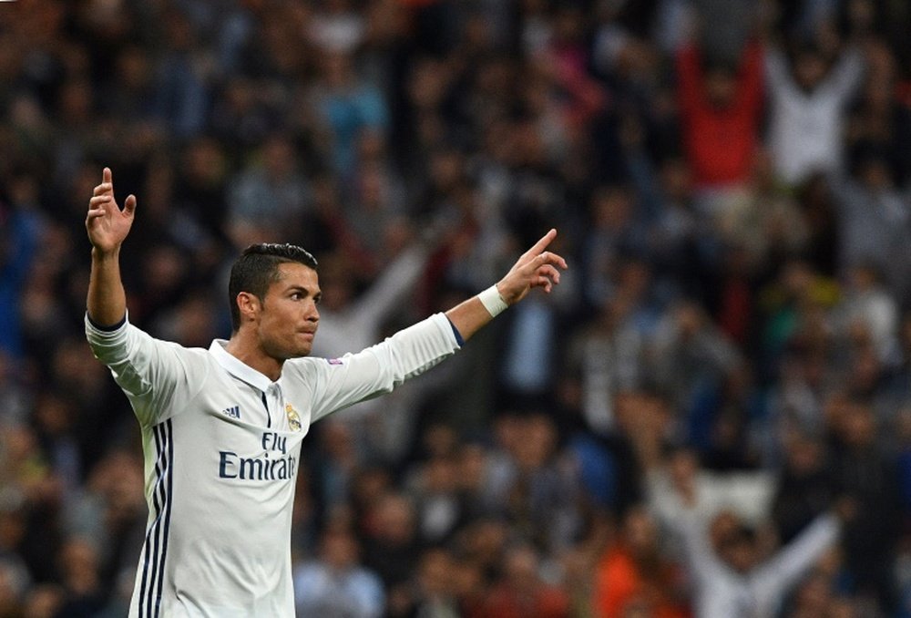 Real Madrids Ronaldo celebrates after scoring the equalizer during the Champions League. AFP