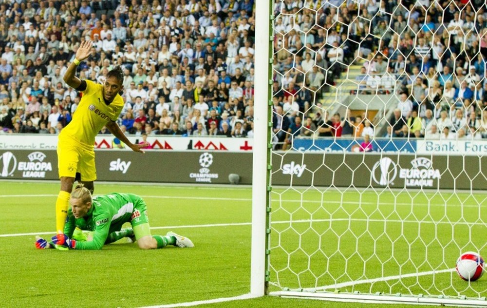 Pierre Aubameyang scores Dortmunds first goal past Odds goalkeeper Sondre Rossbach during the UEFA Europa League match in Skien, Norway on August 20, 2015