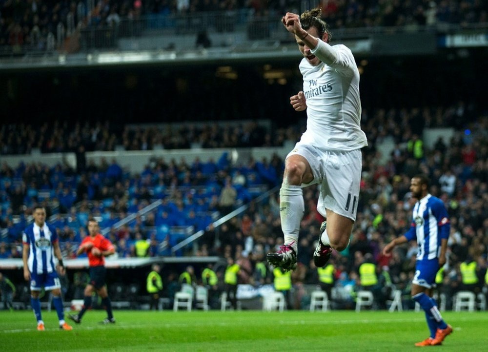 Real Madrids forward Gareth Bale celebrates a goal during the Spanish league football match Real Madrid CF vs RC Deportivo de la Coruna in Madrid on January 9, 2016