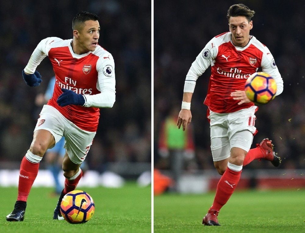 Wenger has given an update on the futures of Sanchez and Ozil. AFP
