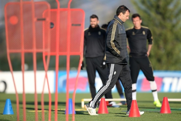 Juventus coach Massimiliano Allegri takes part in a training session at the Juventus Training Center in Vinovo, near Turin, on November 24, 2015
