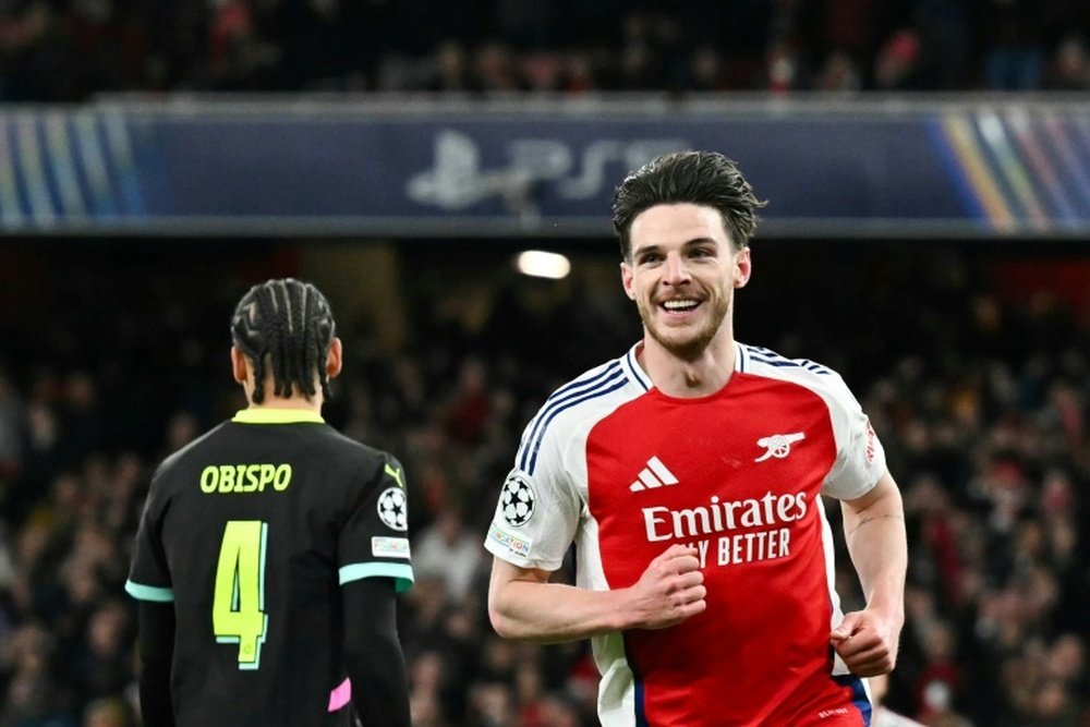 Rice (R) had to fight for his place after being released from Chelsea's academy. AFP