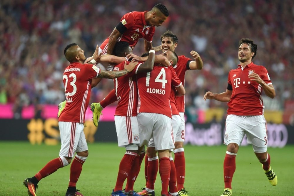 Bayern Munich celebrate after scoring against Werder Bremen. AFP