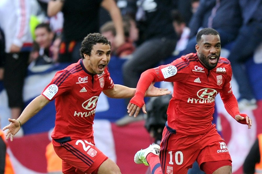 Lyon, whose leading scorer Alexandre Lacazette, right, has this week been linked with a move to Barcelona, will look to defend their unbeaten record when they host Gazelec.