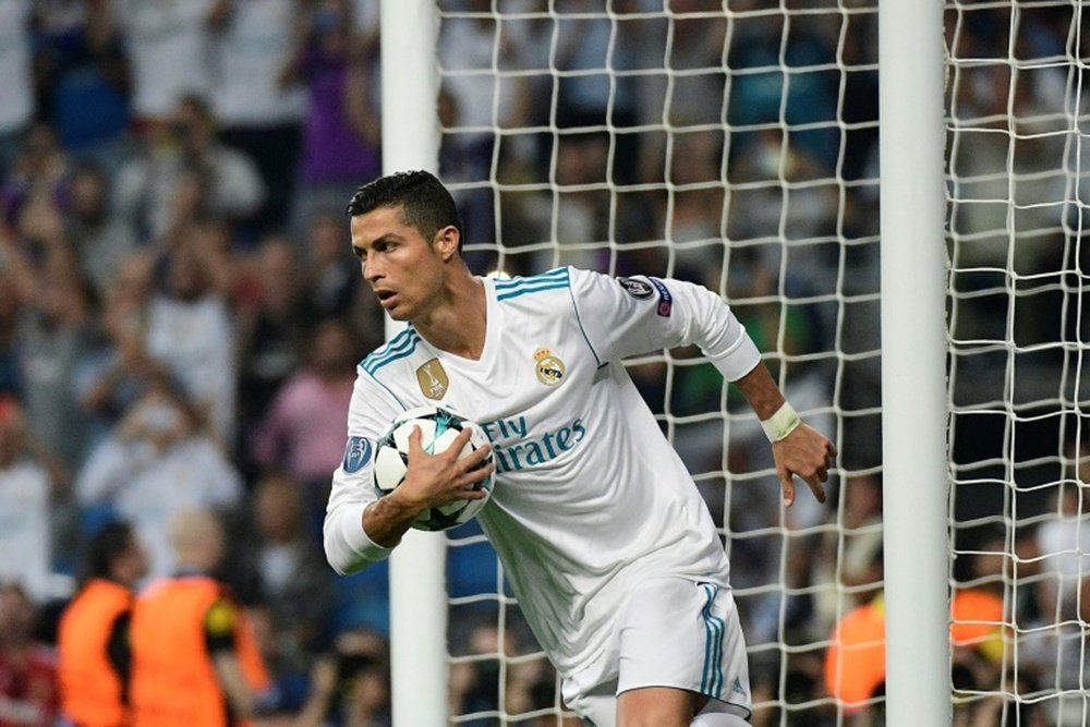 Cristiano Ronaldo célèbre un but sur penalty face à l'Apoel en C1. AFP
