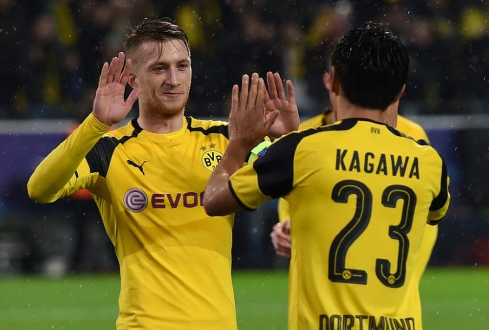 Marco Reus (L) and Shinji Kagawa celebrate a goal against Legia Warsaw. AFP