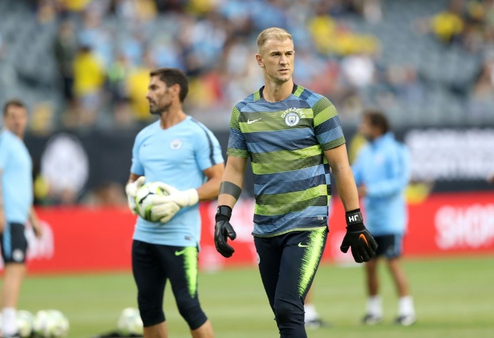 Hart will complete his move to Burnley on Tuesday. AFP