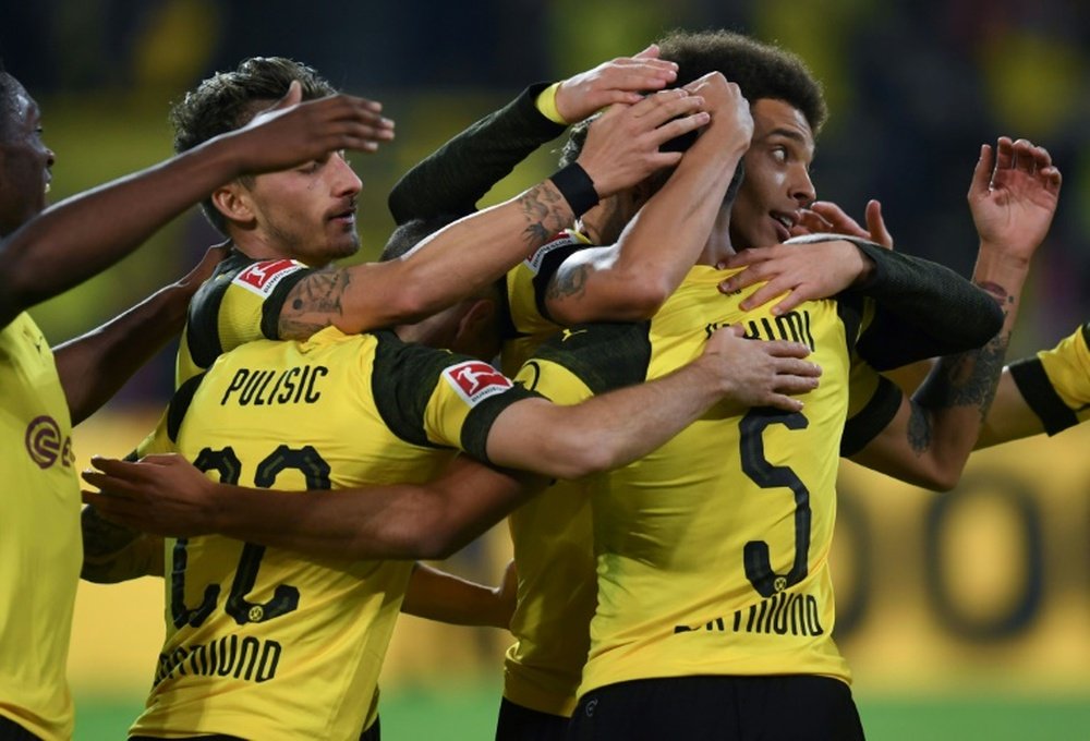 All smiles for Dortmund. AFP