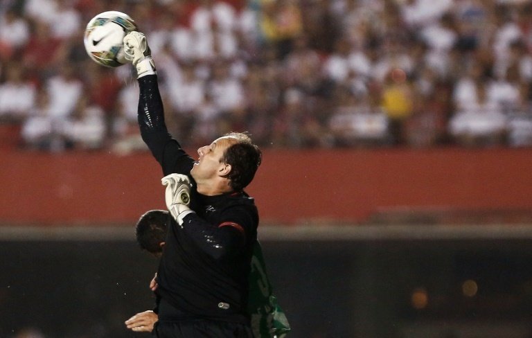 Rogerio Ceni, the highest-scoring goalkeeper in history, charmed the world with his golden boots, but it is his magical gloves that will be most missed at the club where he spent his career, Brazils Sao Paulo. AFP PHOTO / Miguel SCHINCARIOL
