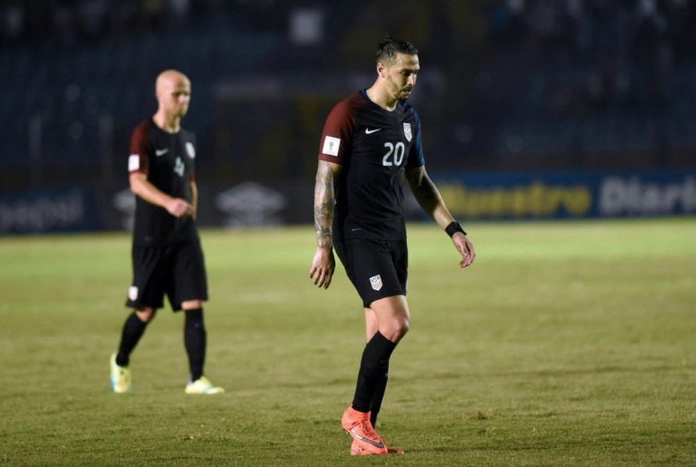 USAs Geoff Cameron leaves the field in dejection after being defeated by Guatemala 2-0 in a 2018 FIFA World Cup qualifying football match, in Guatemala City, on March 25, 2016