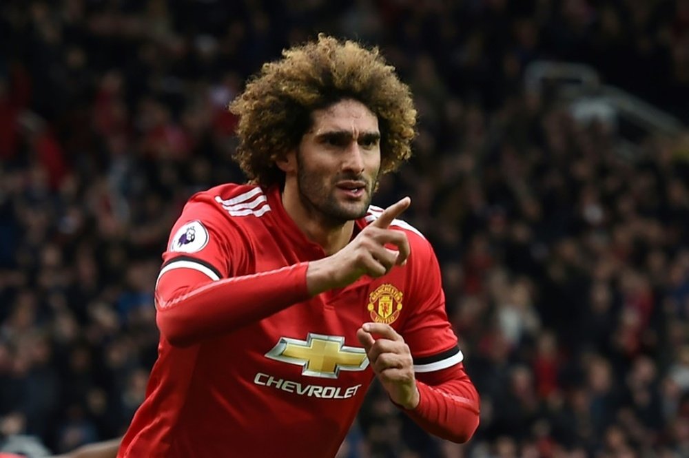 Fellaini headed home the winner in stoppage time. AFP