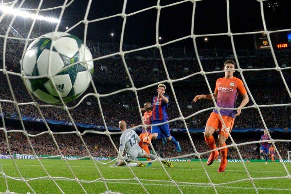 Messi scoring one of his three goals. AFP