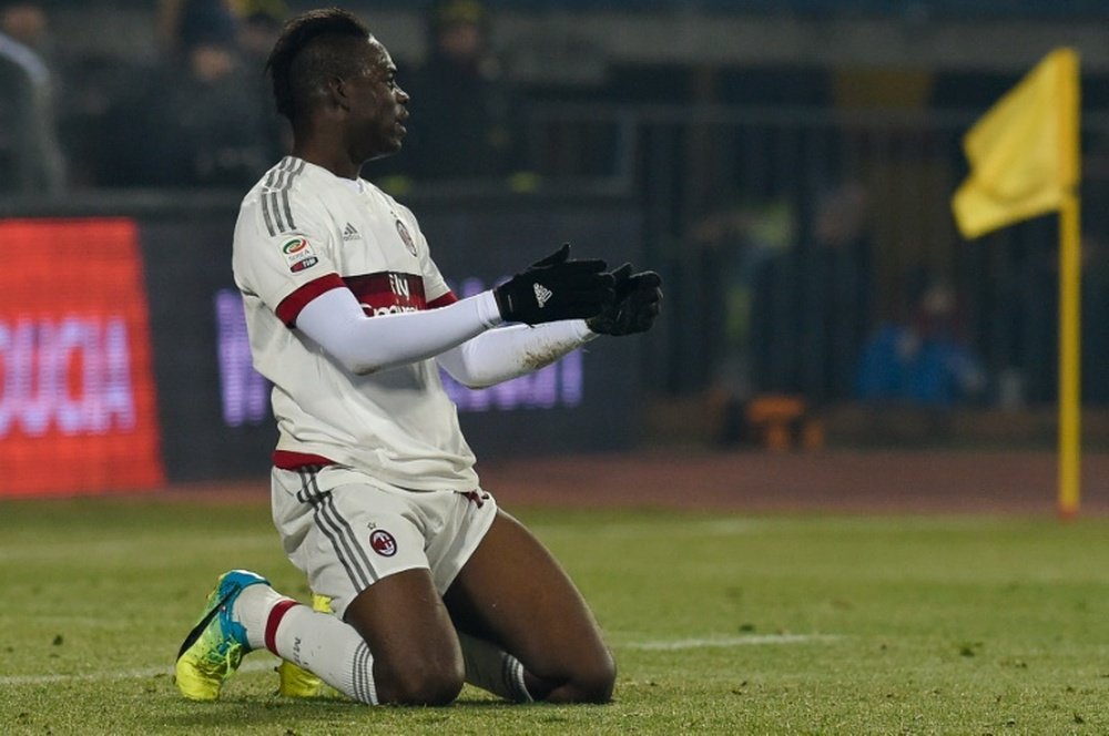 AC Milans forward Mario Balotelli reacts after missing a goal opportunity during the match against Empoli on January 23, 2016