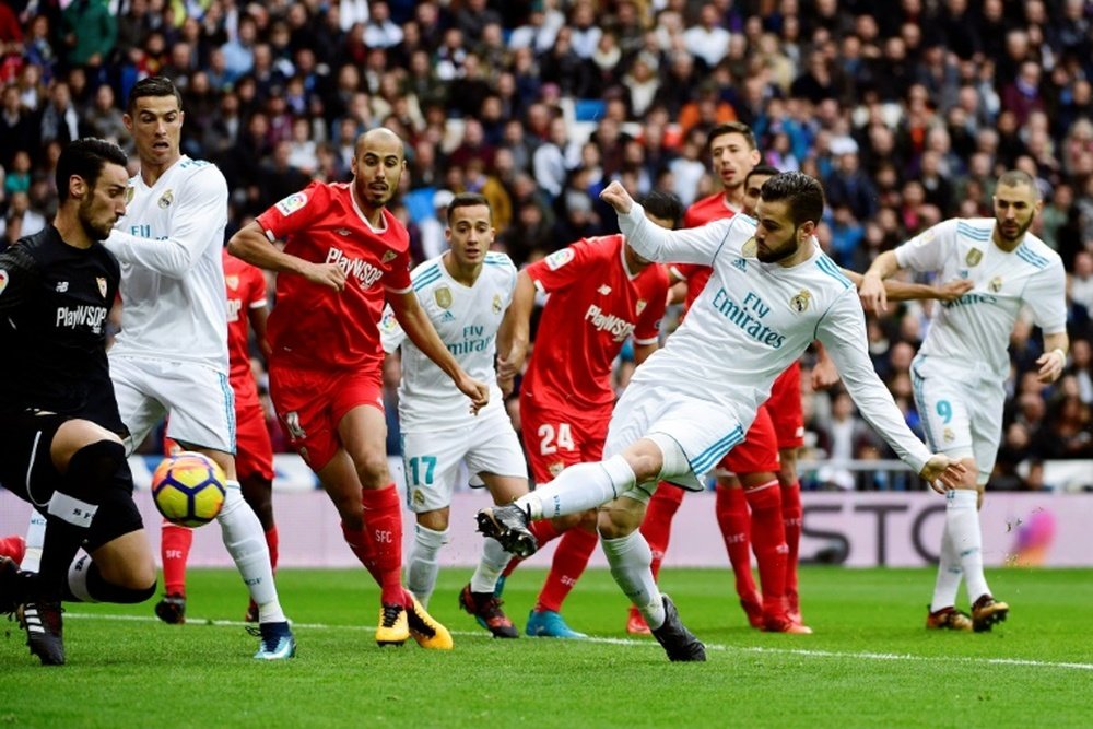 Nacho marcó el primero del Madrid en las dos última visitas del Sevilla. AFP