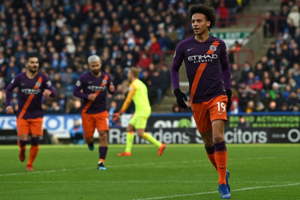 Guardiola's side won comfortably against lowly Huddersfield. AFP
