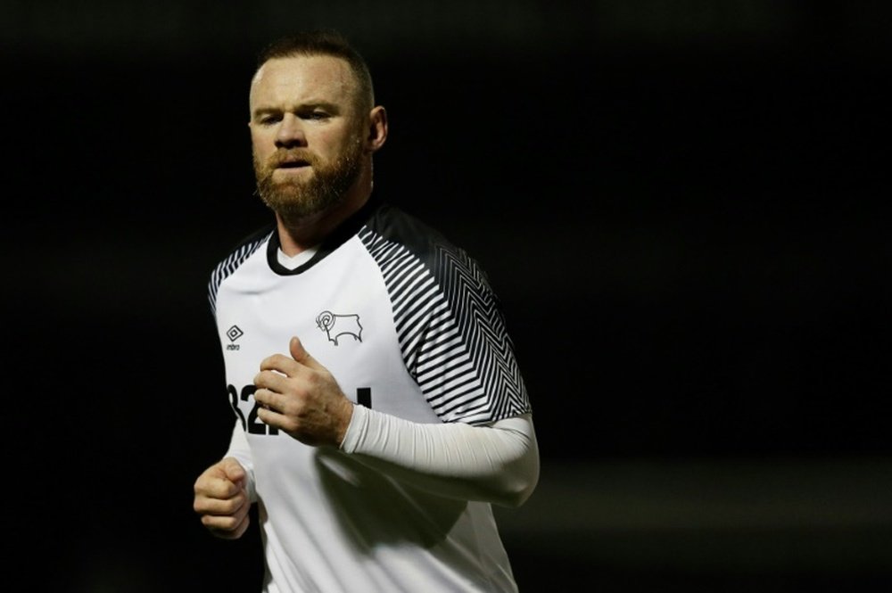 Wayne Rooney, crítico ao lidar com a pandemia do COVID-19. AFP