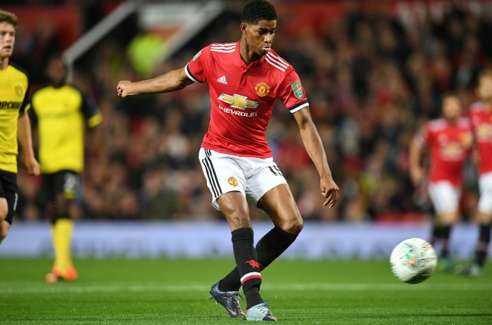 Rashford was withdrawn due to a knee injury during United's 1-0 win at Benfica. AFP