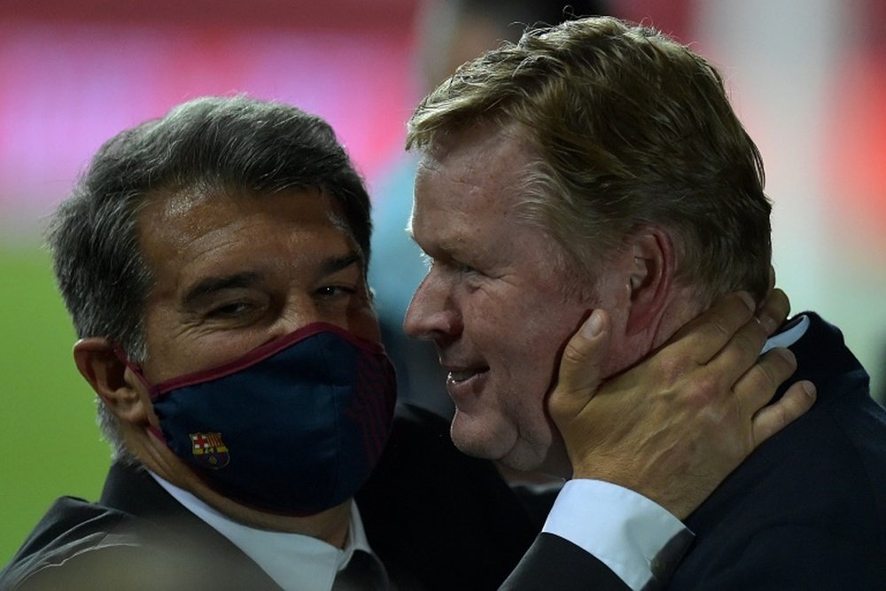 Laporta confirmed that Koeman will remain in charge of Barca. AFP