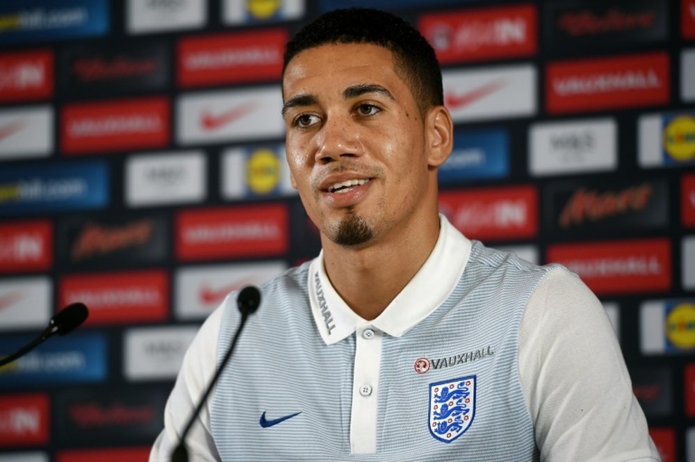 Smalling was full of praise for the two in-form strikers. AFP