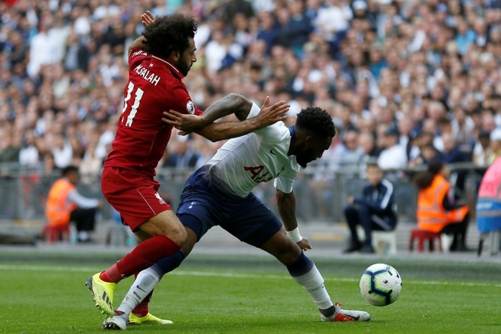 Rose battles Mo Salah. AFP