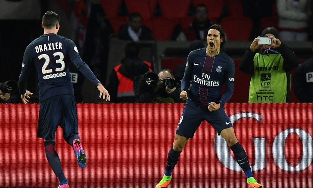 Cavani and Draxler celebrating a goal. AFP