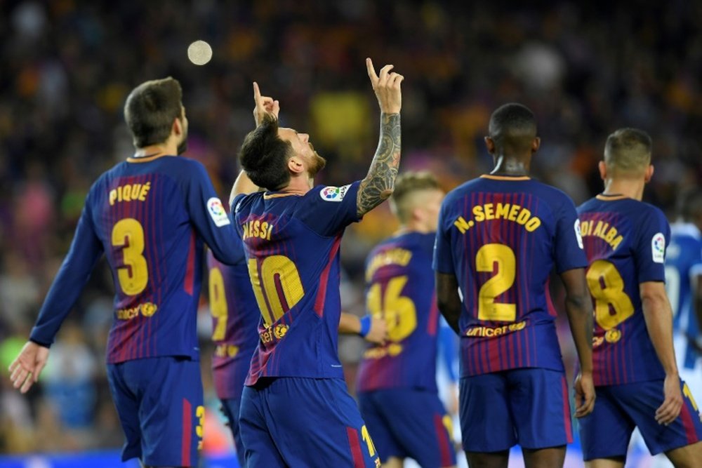 Lionel Messi triple buteur pour le Barça a dominé le derby catalan contre l'Espanyol. AFP