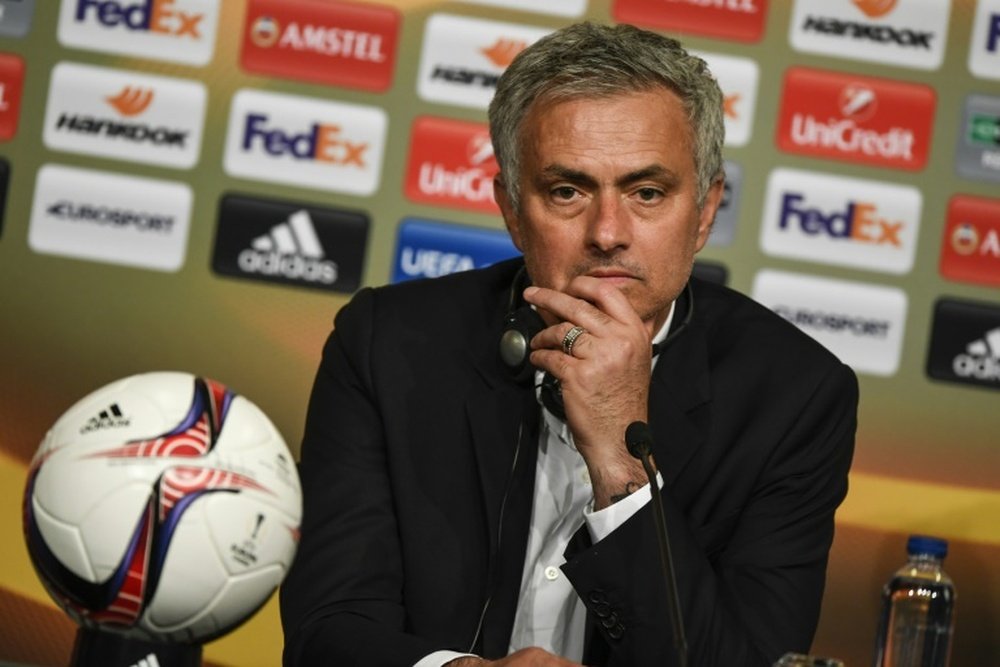 Mourinho refused to talk about why he didn't shake Mark Hughes' hand. AFP