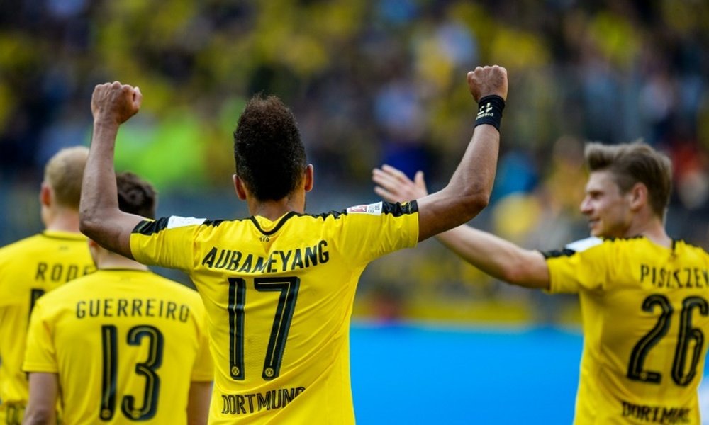 Les joueurs de Dortmund, dont l'attaquant Aubameyang, fêtent leur succès face à Hoffenheim. AFP